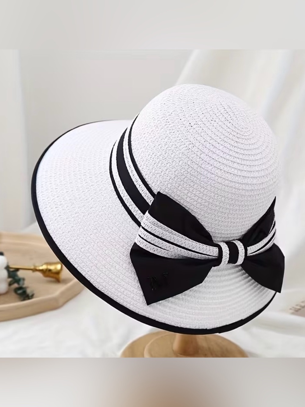 Women's White Sun Hat with Black Trim and Decorative Bow